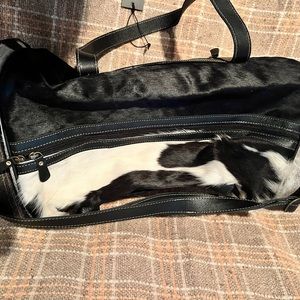 Weekend travel hair on hide duffle